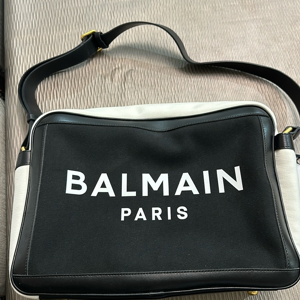 Balmain kids diaper bag with changing pad.